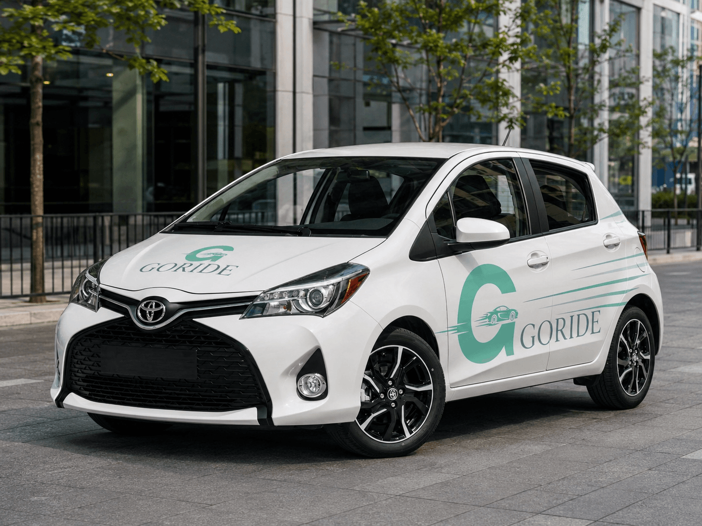 GoRide-style branded compact car on a city street
