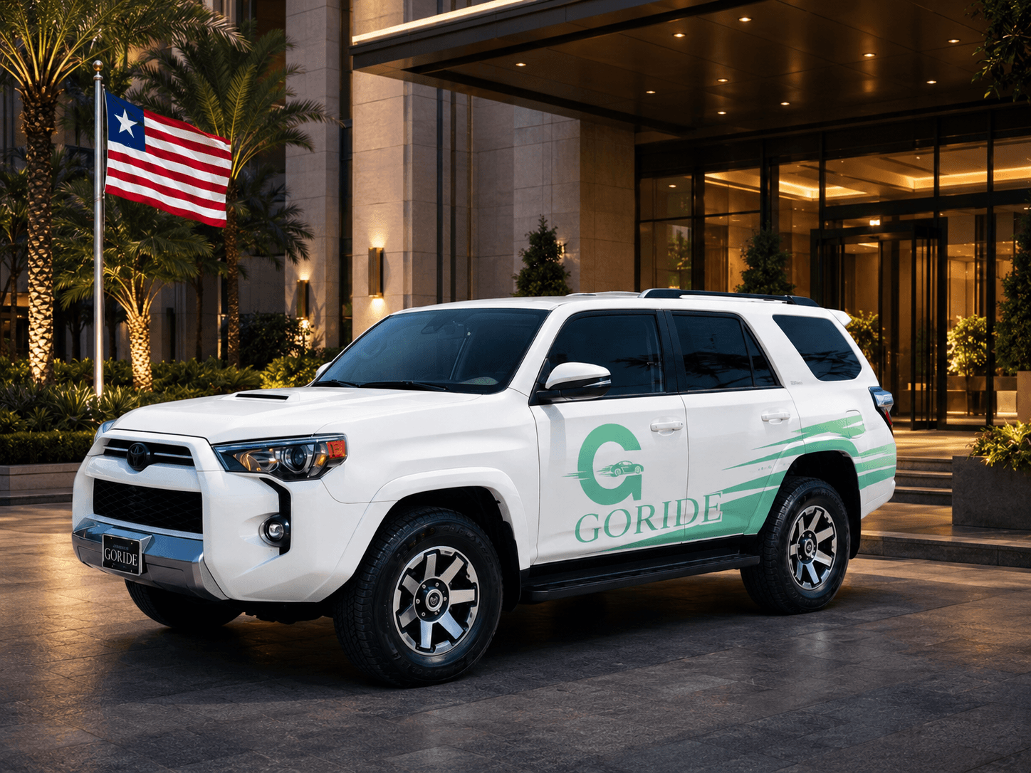 GoRide-style branded SUV outside a premium hotel entrance